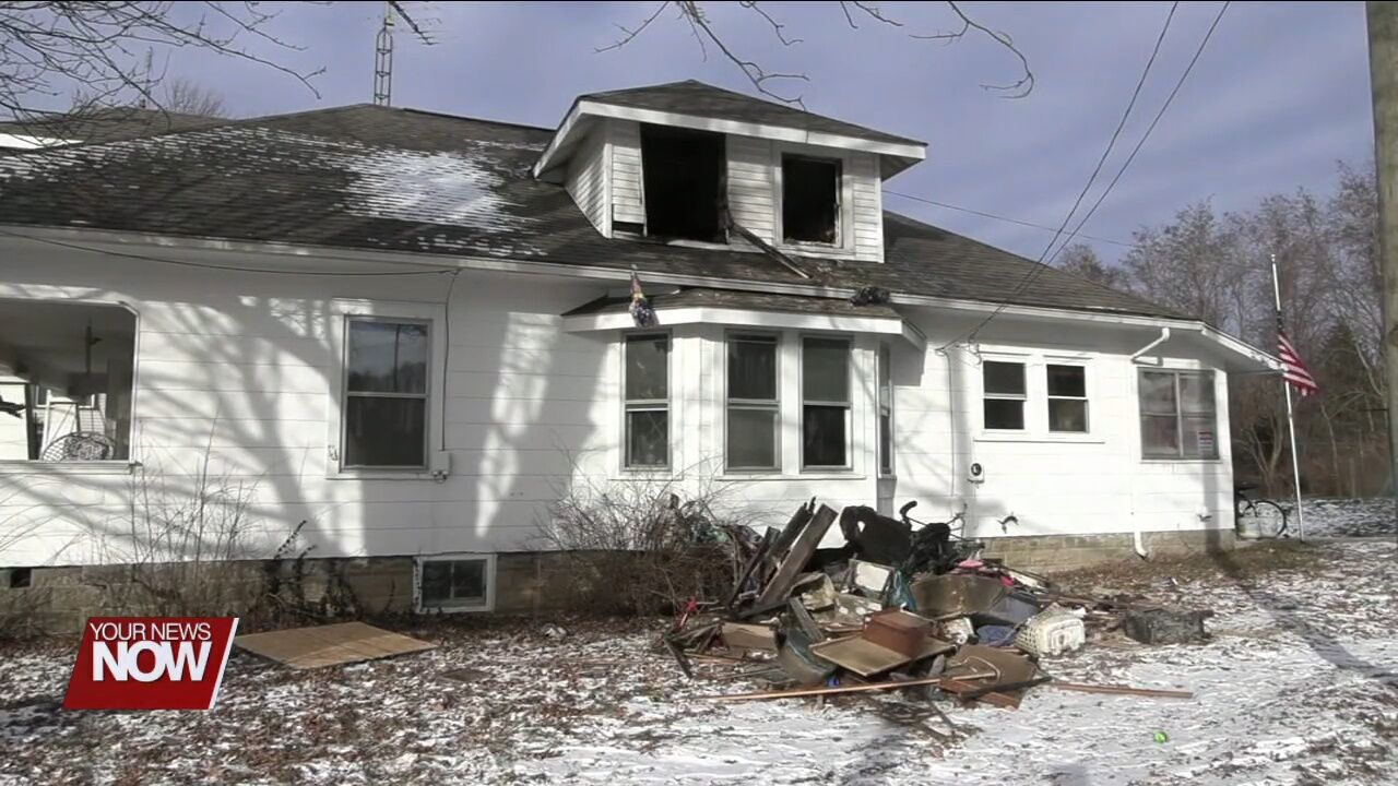Fire crews battle morning house fire in Lafayette